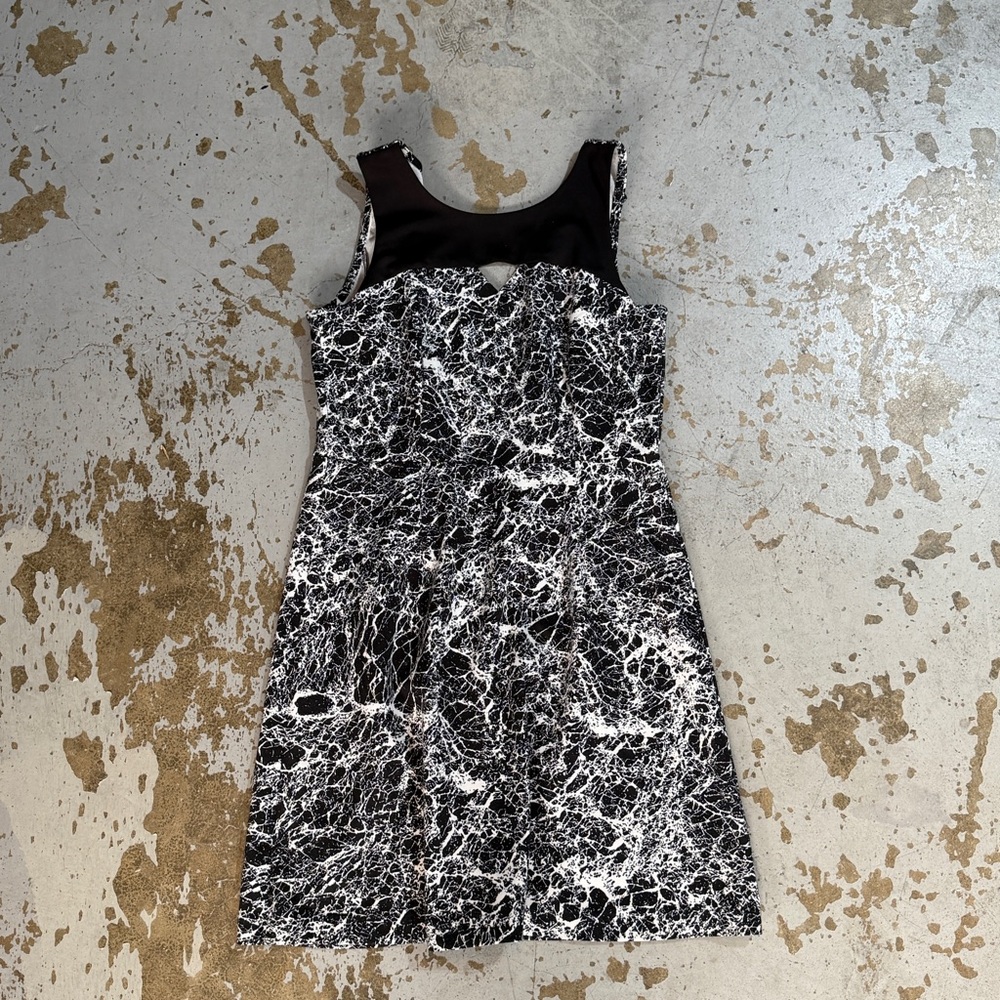 attention black and white marble cocktail dress with keyhole detail
